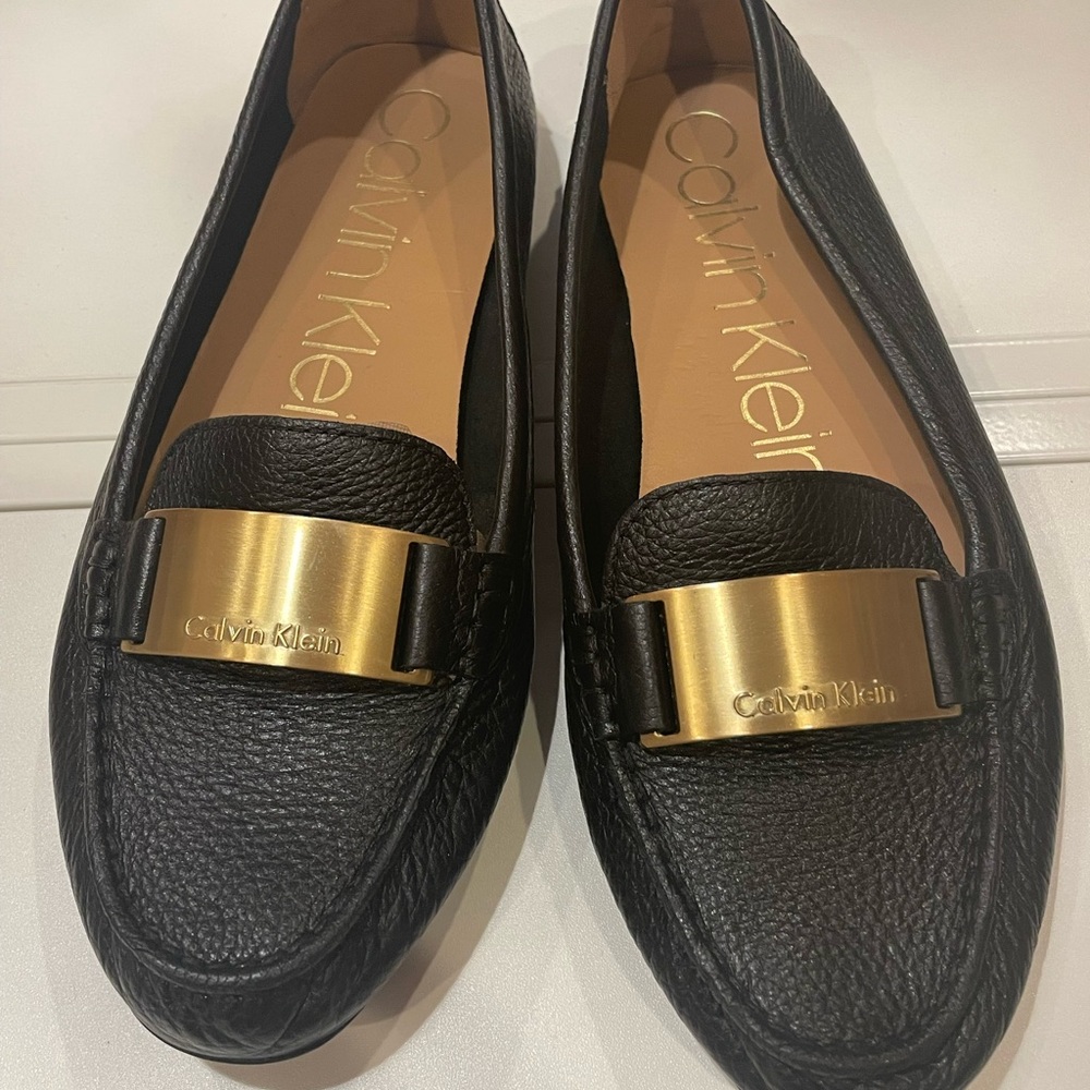 Never worn Calvin Klein Lisette leather loafers size 9.